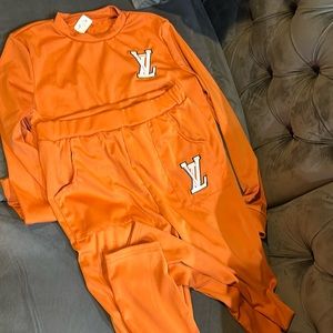 Stretchy warm up track style suit